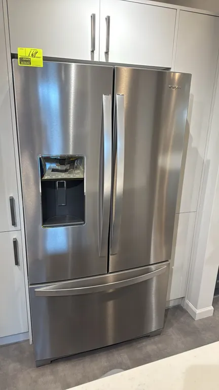 Whirlpool WRF757SDHZ03 French door refrigerator with bottom freezer drawer. Features stainless steel finish, in-door ice and water dispenser, adjustab