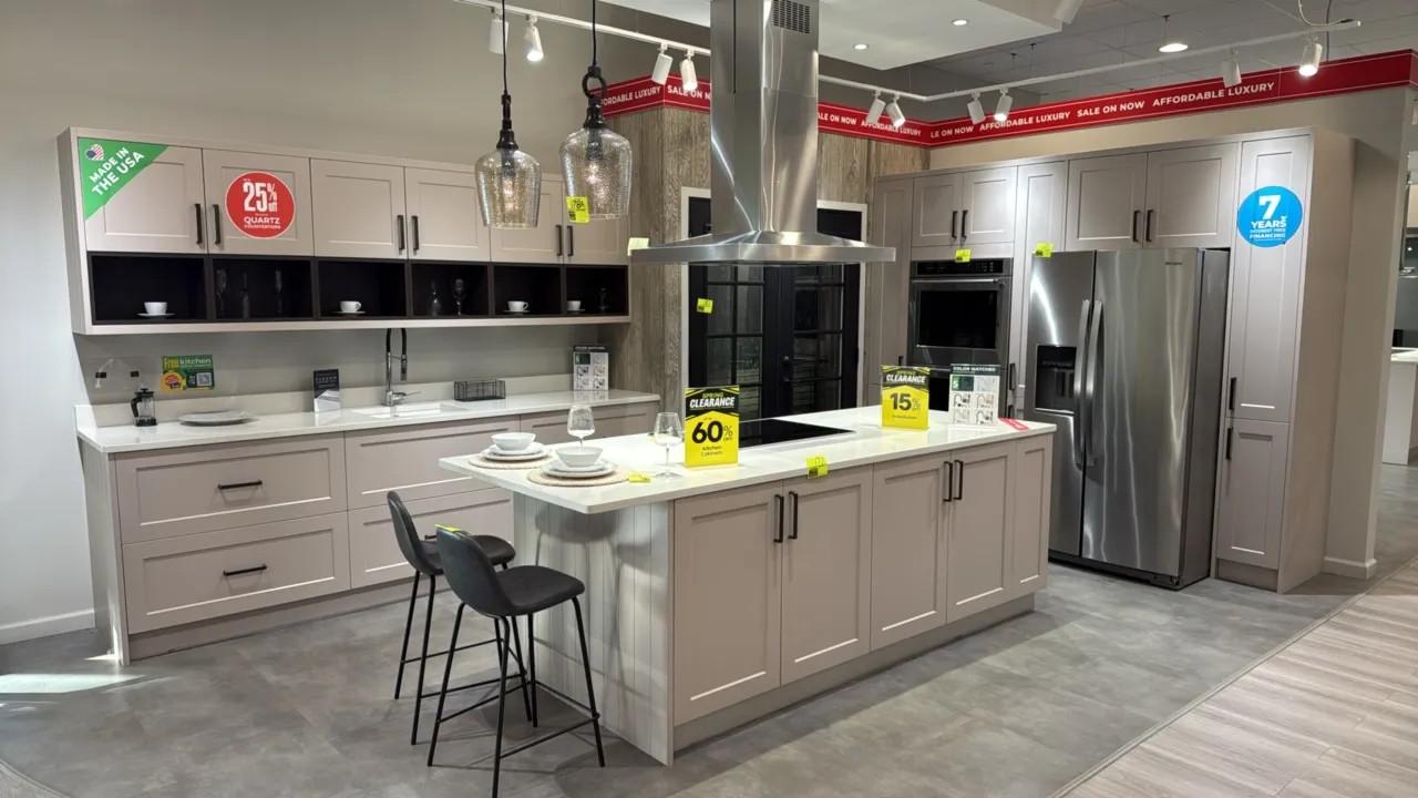 Infinity Plus kitchen cabinet set. Features quartz countertops, 104" x 40" island cabinets with countertop, 110.5" upper and lower cabinets with count