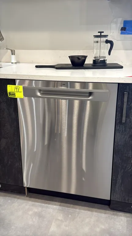 GE GDP630PYR5FS 24" undercounter dishwasher. Features stainless steel finish, pocket handle, top digital controls, 3rd rack, and silverware basket. S/