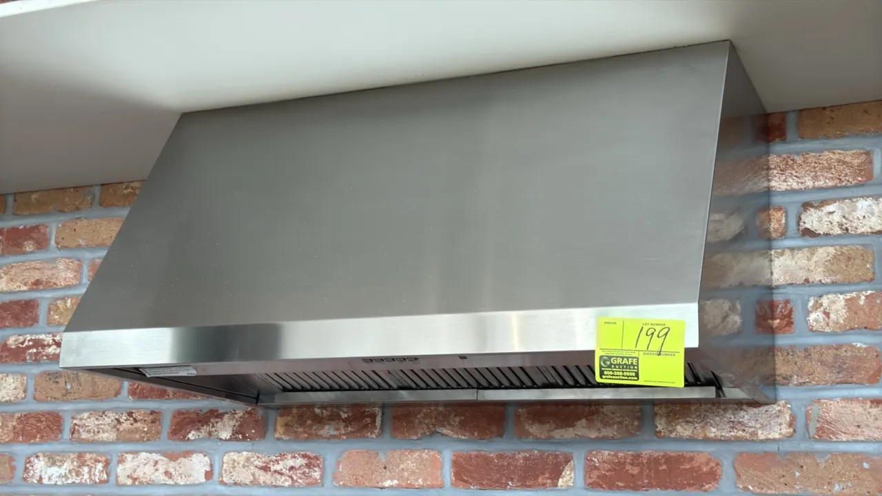 GE stainless steel range hood. Features stainless steel baffle filters, dual cooktop lights, push-button controls with 3 fan speeds and boost mode, Wi