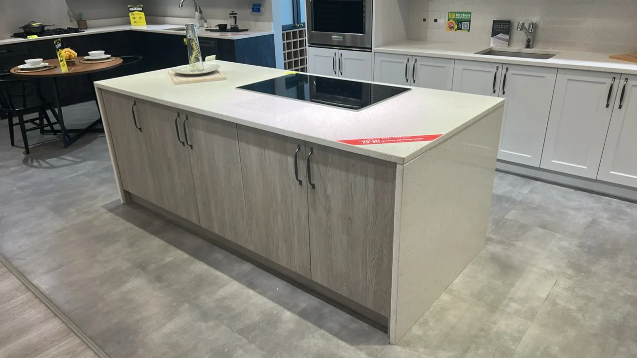 Infinity Plus kitchen island and cabinet suite. Includes 94" x 40" x 36" island with quartz countertop and laminate cabinets, and 153" x 99" laminate