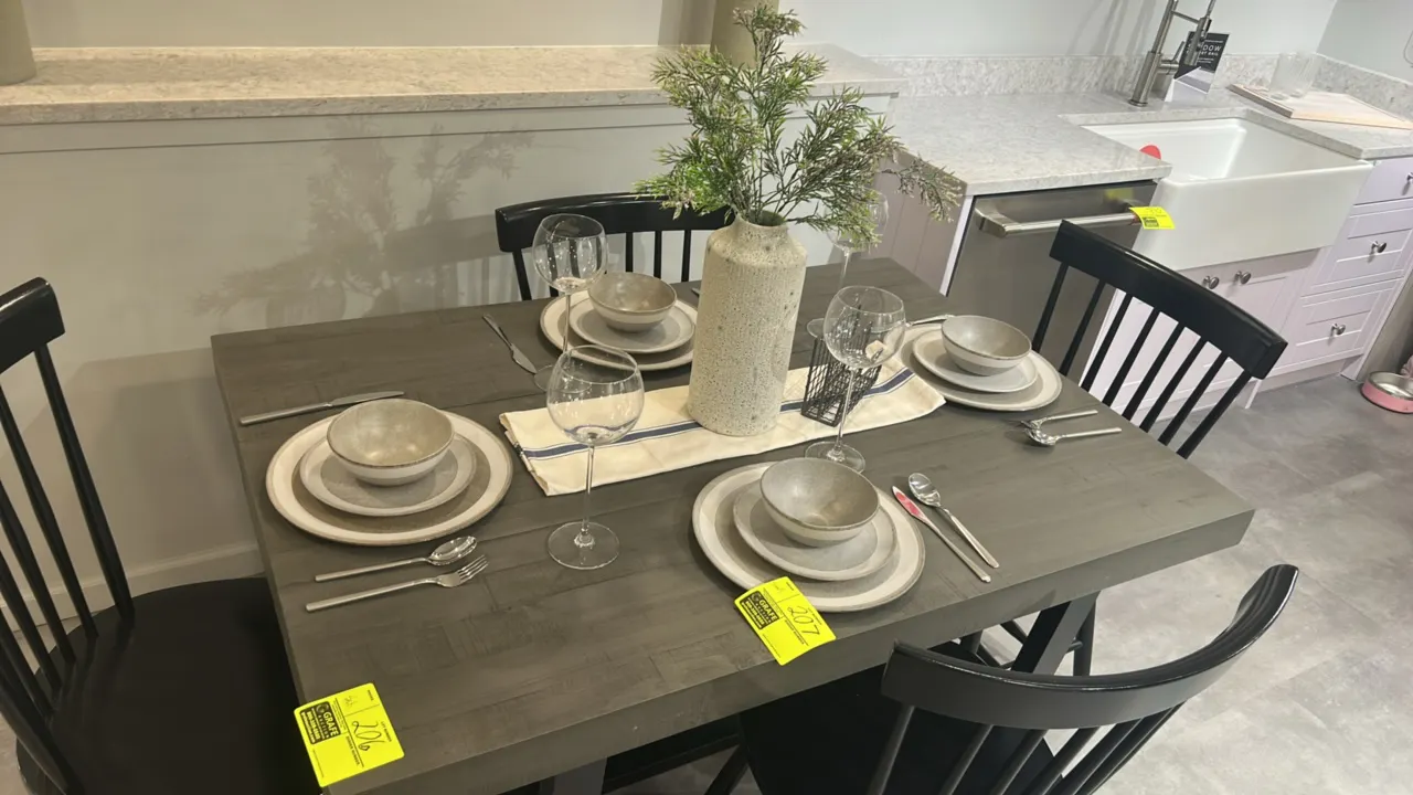 Tabletop dining and decor set. Includes ceramic dinner plates, salad plates, bowls, flatware (forks, knives, spoons), stemmed wine glasses, textured v