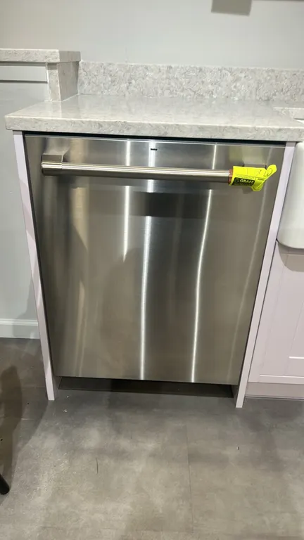 Café CDT805P2N4S1 built-in dishwasher. Features a stainless steel finish, towel-bar handle, stainless steel interior tub, three-tier racking system, a