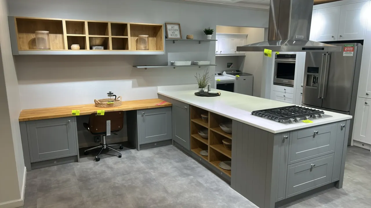Infinity Plus laminate kitchen cabinets and countertops. Includes 135" x 118" section with butcher block and quartz countertops, and 195" x 99" sectio