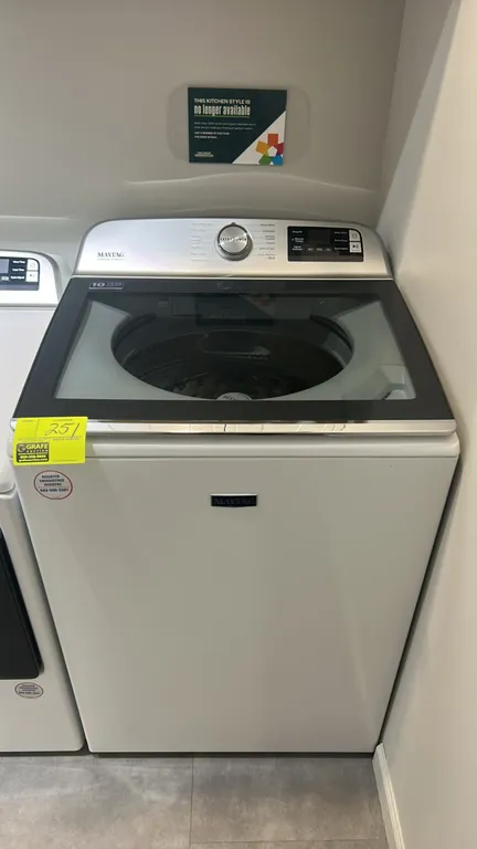 Maytag MVW7230HW0 electric top-load smart washer. Features glass viewing lid, stainless steel wash basket, central power agitator, and digital control
