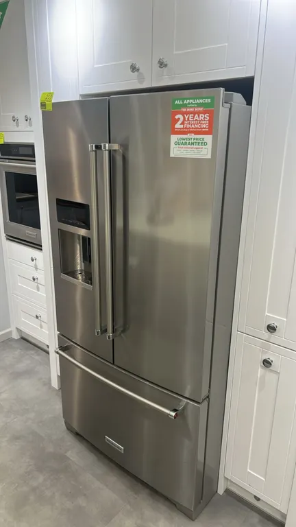 KitchenAid KRFF507HPS02 French door refrigerator and freezer. Features stainless steel finish, exterior water and ice dispenser, interior glass shelvi
