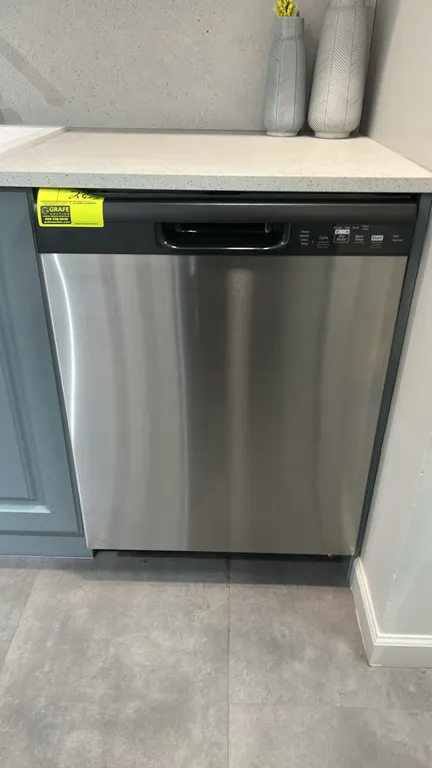 GE Appliances GDF535PSR3SS built-in electric dishwasher. Features stainless steel exterior door panel, front electronic controls, two interior dish ra
