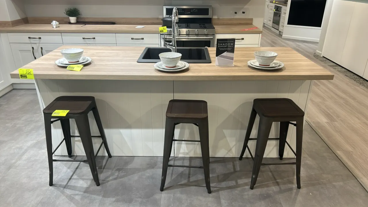 Infinity Plus kitchen island and cabinet set. Features white laminate cabinets, woodgrain laminate countertops, built-in single-basin sink with pull-d