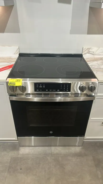 GE Appliances GRS500PV1SS slide-in electric range. Features stainless steel finish, 5-burner smooth ceramic glass cooktop, front control knobs with di