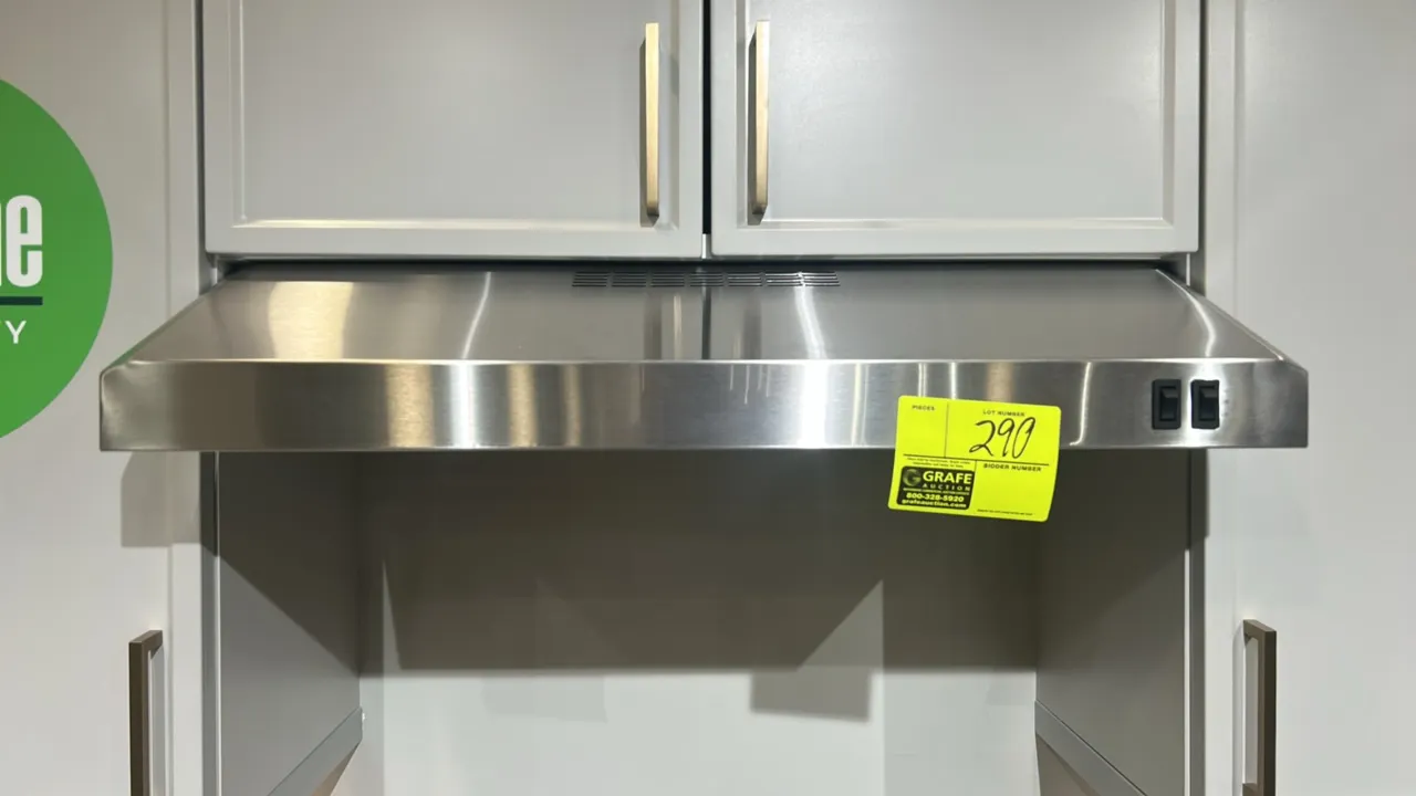 GE Appliances JVX3300SJ4SS under-cabinet range hood. Features stainless steel construction, front rocker switch controls, mesh grease filter, and cook