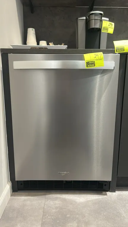 2022 Whirlpool WUR50X24HZ03 self-contained undercounter refrigerator. Features a stainless steel door, glass interior shelves, and door storage bins.