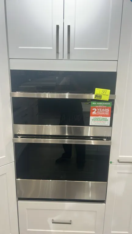 2023 JennAir JMW2430LM03 combination microwave and wall oven. Features stainless steel finish, digital touch display, microwave turntable, crisper pan