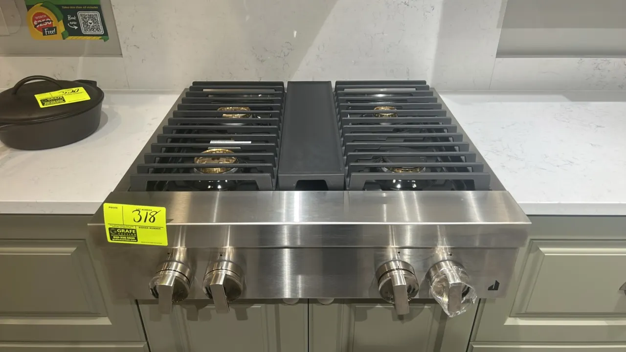 JennAir Noir JGCP430HM00 4-burner gas rangetop. Features stainless steel construction, cast iron grates, brass burners, and front control knobs. 30"W.