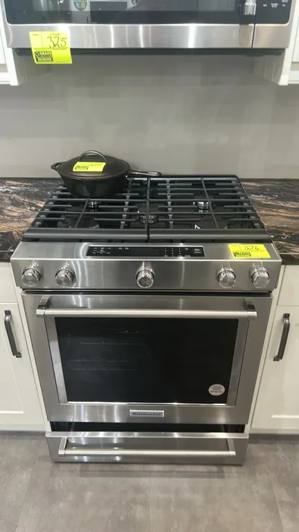 KitchenAid KSGG700ESS3 slide-in 5-burner gas range. Features stainless steel construction, continuous cast iron grates, front control knobs with digit