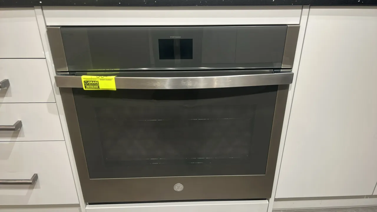 GE Appliances JTS5000EN1ES smart built-in self-cleaning convection single wall oven. Features slate finish with stainless steel handle, touchscreen di