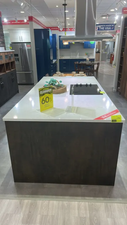 Infinity Plus kitchen island and cabinet set. Features laminate cabinetry, quartz countertops, Blanco stainless steel double-basin undermount sink, an