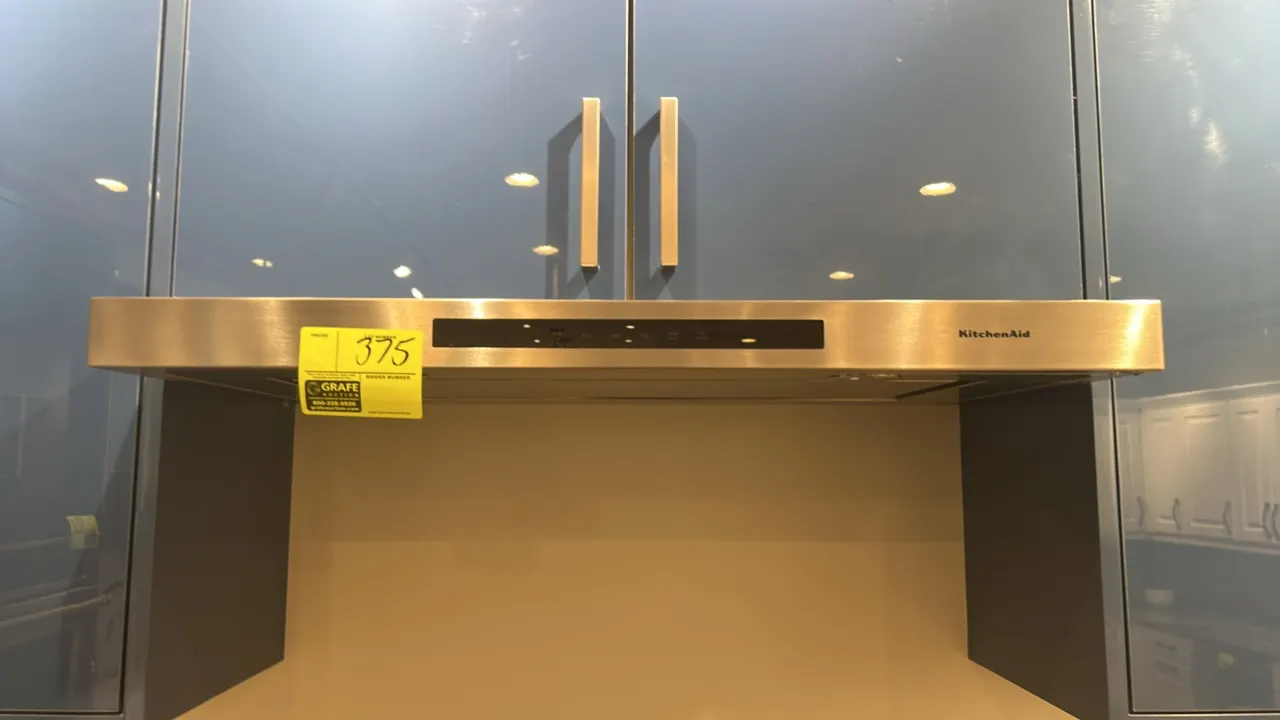 KitchenAid built-in over-range hood. Features stainless steel construction, front electronic controls, and integrated underside lighting. 36"W. Cabine