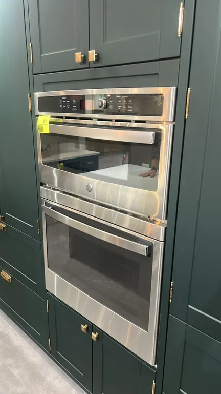 2024 GE Appliances JT3800SH9SS combination microwave and wall oven. Features stainless steel finish, upper microwave with glass turntable, lower oven