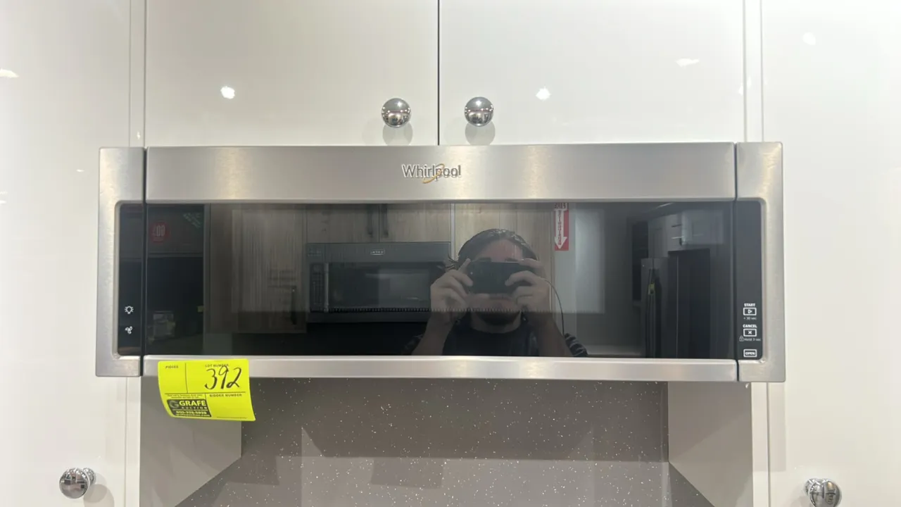 2021 Whirlpool WML75011HZ10 low profile over-the-range microwave hood combination. Features stainless steel exterior, interior glass turntable, and di