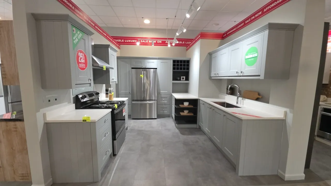 Infinity Plus kitchen cabinet suite. Includes 78" and 58" x 87"H upper and lower cabinets with solid surface countertops, stainless steel sink with fa