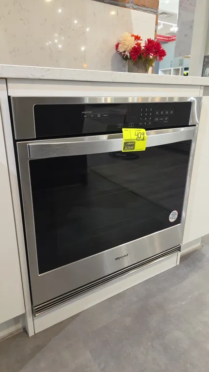 Whirlpool WOS31ES0JS20 30" built-in electric single wall oven. Features stainless steel finish, glass door, digital touchpad controls, and (2) interio