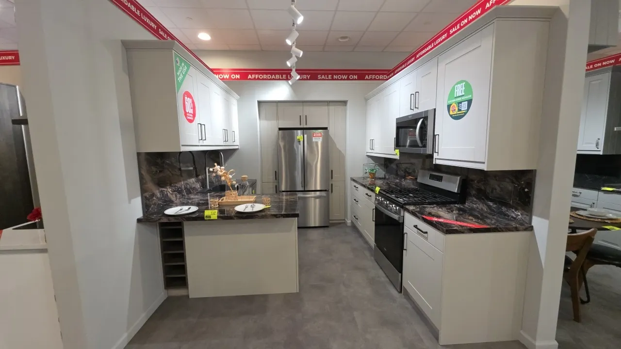 Infinity Plus kitchen cabinet suite. Includes 55" to 37" x 53" L-shape upper and lower cabinets with laminate countertops, backsplash, and sink with f
