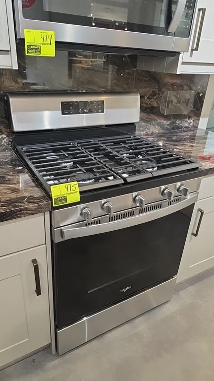 Whirlpool WFG525S0JS2 30" 5-burner natural gas range. Features stainless steel finish, continuous cast-iron grates, center oval burner, digital contro