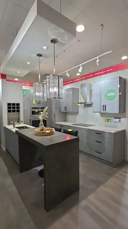 Wren Kitchens Infinity Plus kitchen cabinet suite. Includes 58" lower sink cabinet with quartz countertop and stainless steel sink/faucet, 60" x 38"H