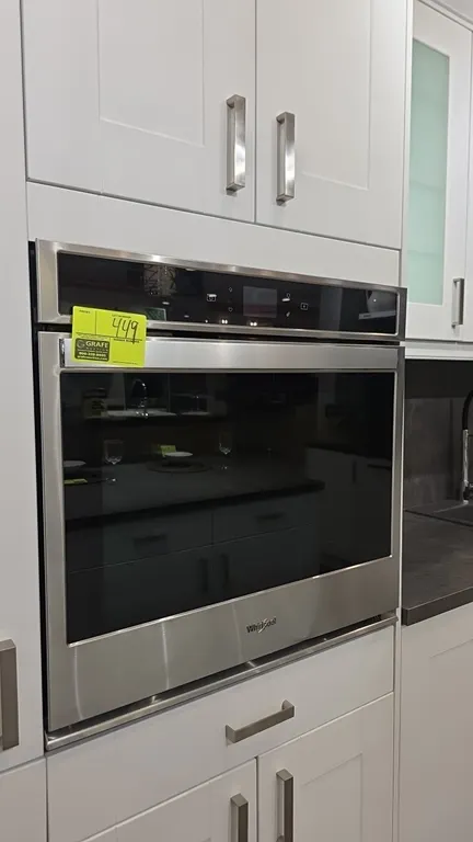 Whirlpool WOS51EC0HS02 30" built-in single oven. Features stainless steel finish, glass front door, touchscreen controls, and (2) interior wire racks.