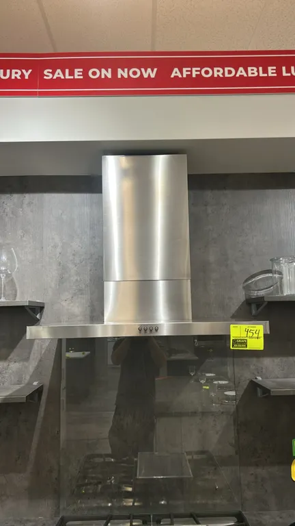 Whirlpool WVW57UC0FS3 stainless steel wall-mount flat range hood. Features push-button controls, integrated cooktop lighting, and stainless steel chim