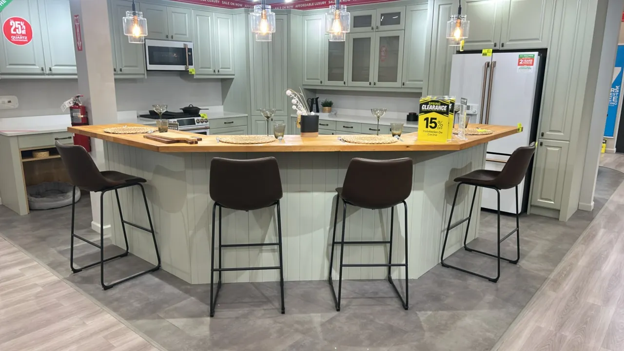 Infinity Plus kitchen cabinet set with island. Island features laminate cabinetry, solid surface and butcher block countertops, and Blanco double-bowl