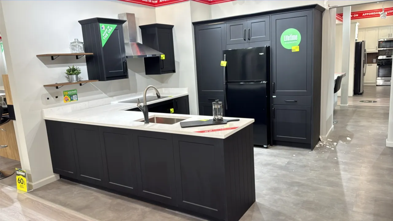 Infinity Plus kitchen cabinets. Includes quartz countertops, undermount stainless steel sink, and pull-down faucet. Dimensions: 105" x 72" L-shaped ba