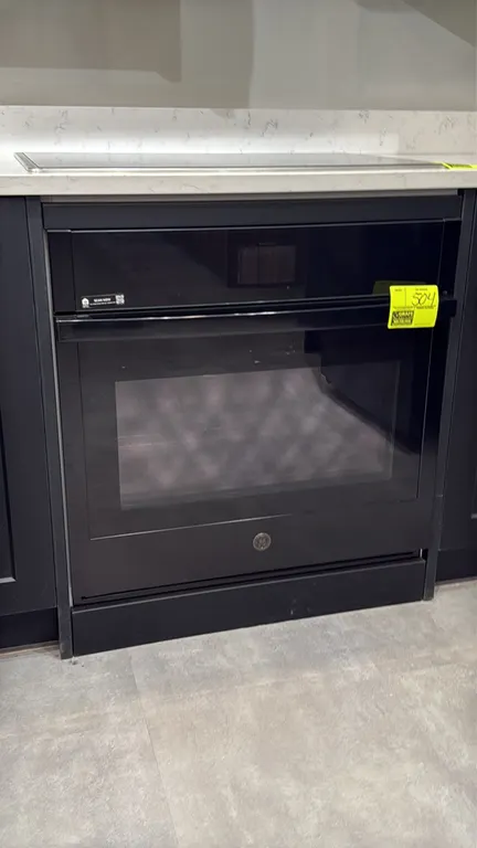 GE JTS5000DN1BB built-in convection wall oven. Features Wi-Fi Connect, digital display panel, two interior racks, and black finish. 30"W. S/N: GT15712