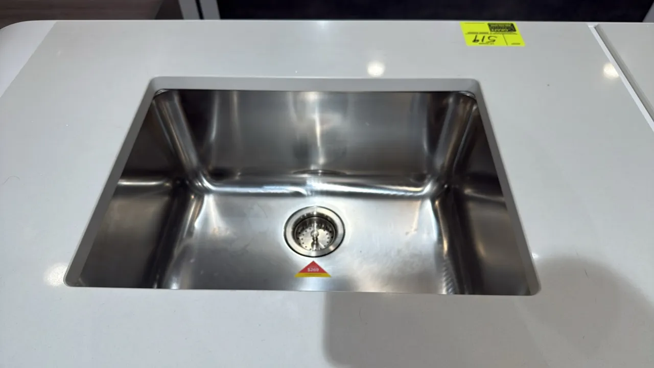 24" single-bowl stainless steel dual mount sink, model SI.UKI.SS.01.004. Features stainless steel construction and includes drain basket strainer. Not
