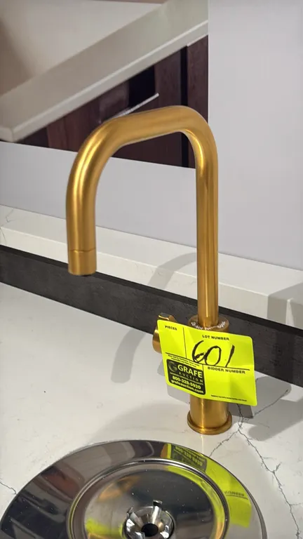 Brushed gold water filler drink faucet. Features gooseneck spout and rotary side control knob. Single-hole deck mount installation. Countertop and pit