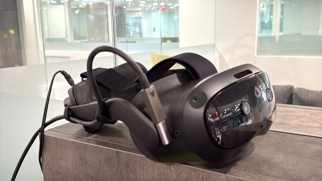HTC VIVE Focus Vision virtual reality headset. Features integrated tracking cameras, adjustable head strap with rear fit dial, cushioned face gasket,