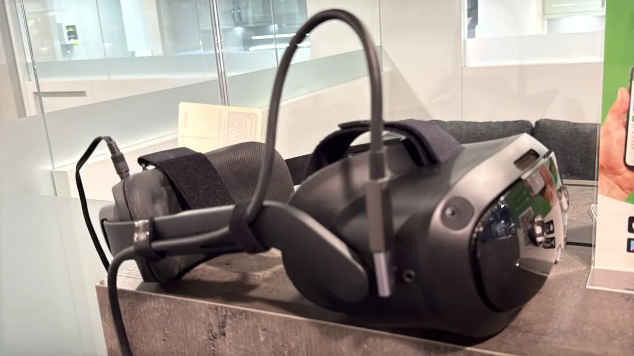 HTC VIVE Focus Vision virtual reality headset. Features front tracking cameras, cushioned facial interface, adjustable rigid head strap with rear sizi