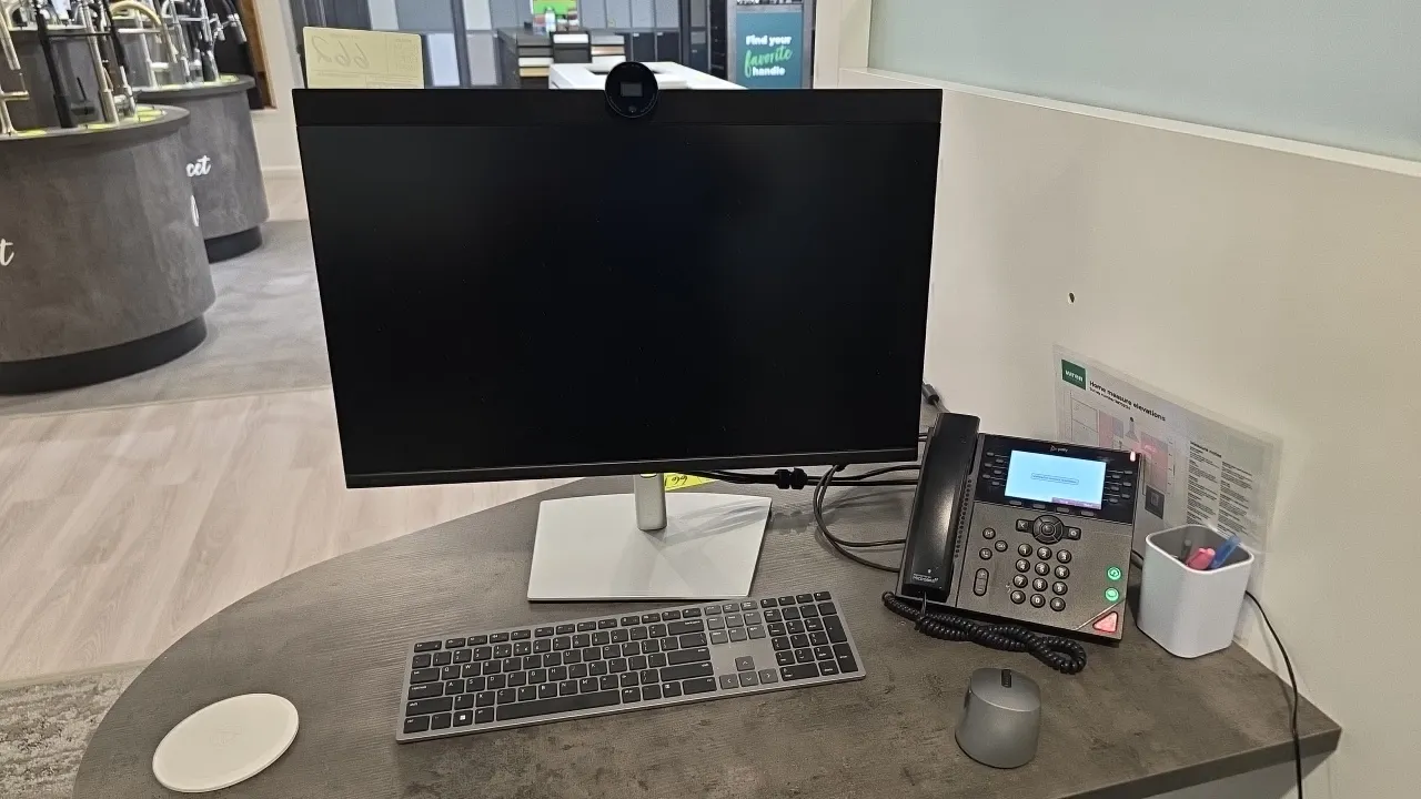 Dell 24" computer monitors. Features 24" screen size, integrated webcam, desktop stand, and connectivity ports including HDMI and DisplayPort. Include
