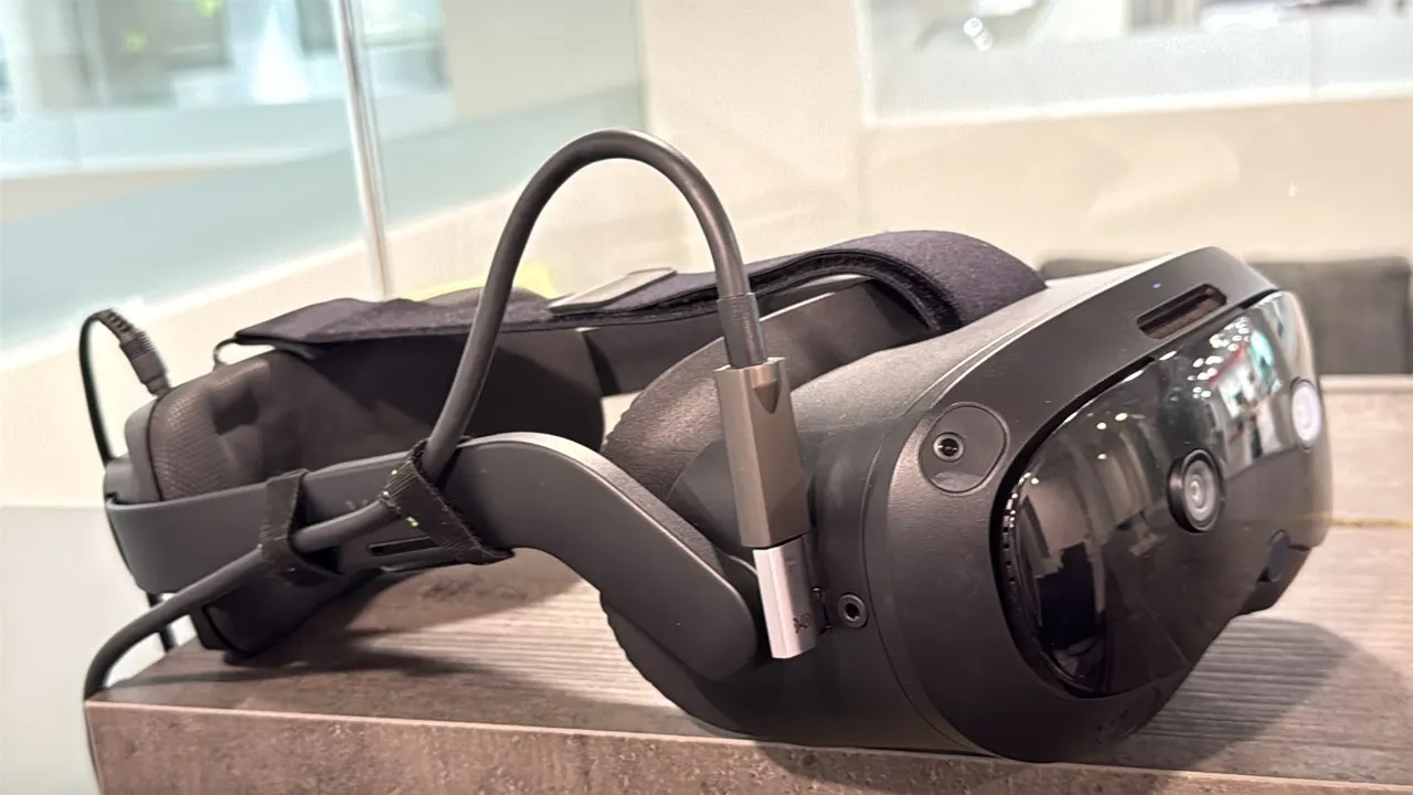 HTC VIVE Focus Vision virtual reality headset. Features integrated tracking cameras, adjustable rigid head strap with top strap, cushioned facial inte
