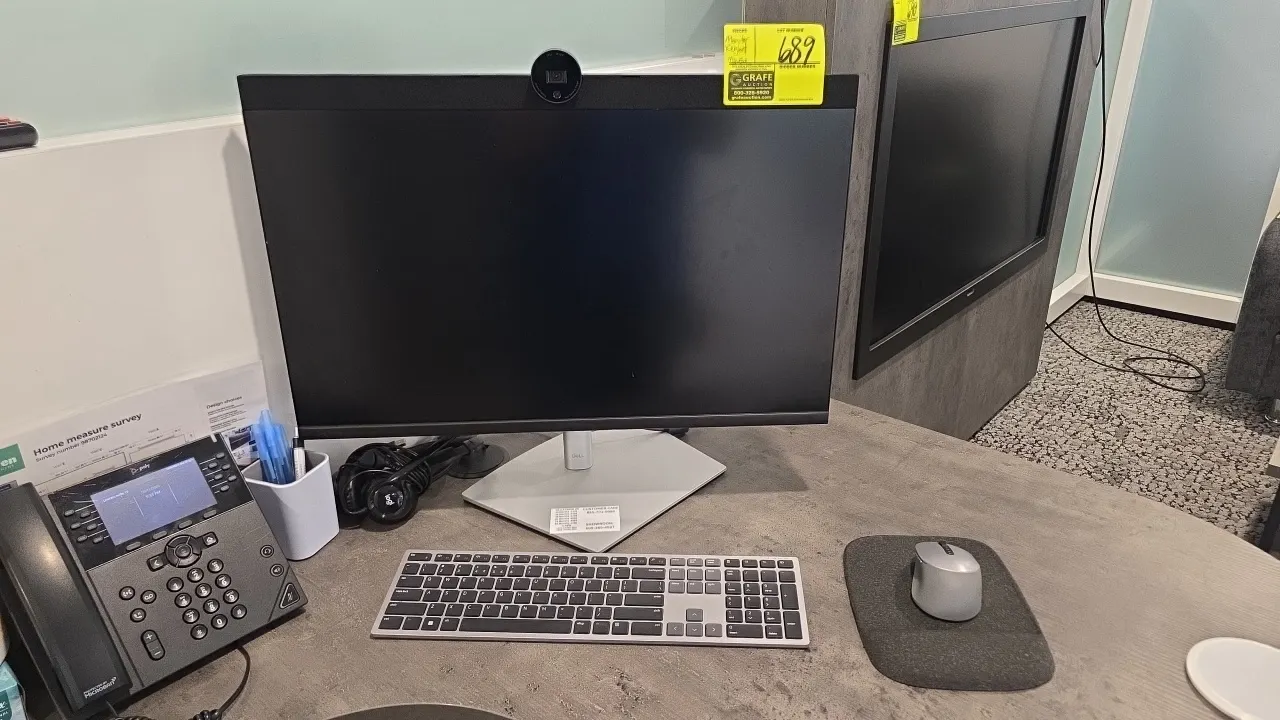 Dell P2724DEB flat panel monitor. Features HDMI and DisplayPort connections, and integrated pop-up webcam. Includes wireless keyboard and wireless mou