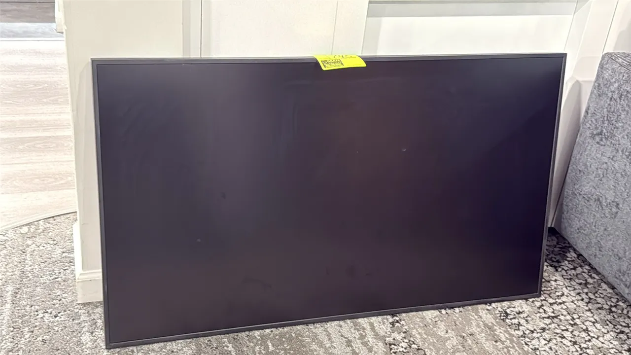2021 Samsung QM50R-A 50" flat screen color display monitor. Model code: LH50QMRABGCXGO. S/N: 0EHJ3HCRA03153M. Electrical: 100-240V, 50/60 Hz, 1.4A.