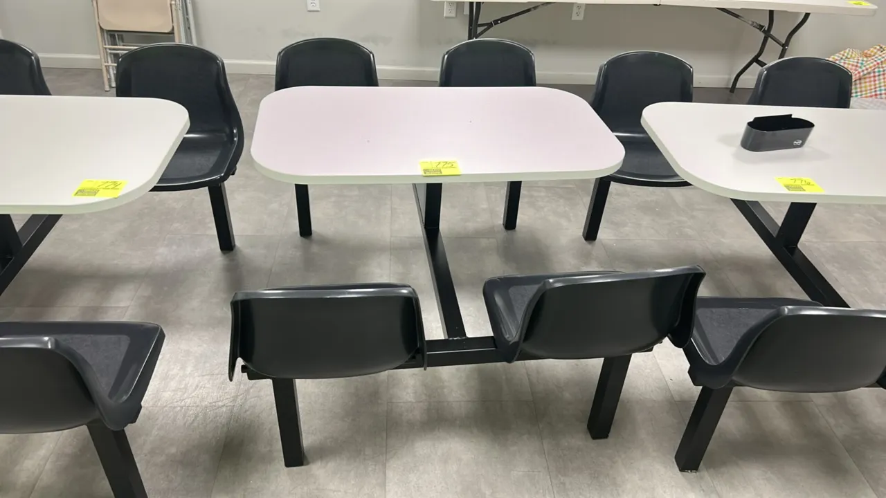4-person break room table. Features a laminate top with rounded corners and (4) attached black molded plastic seats. Tabletop measures 41" x 24". Moun