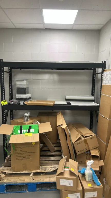 Metal 3-tier light-duty warehouse racking. Features black finished steel frame and wire grid decking. 76"W x 24"D x 78"H. Contents not included.