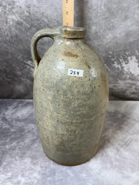 (1) Gallon Jug. Very good condition with one small chip on the mouth. Ohio or PA maker possibly. Circa 1870-1890