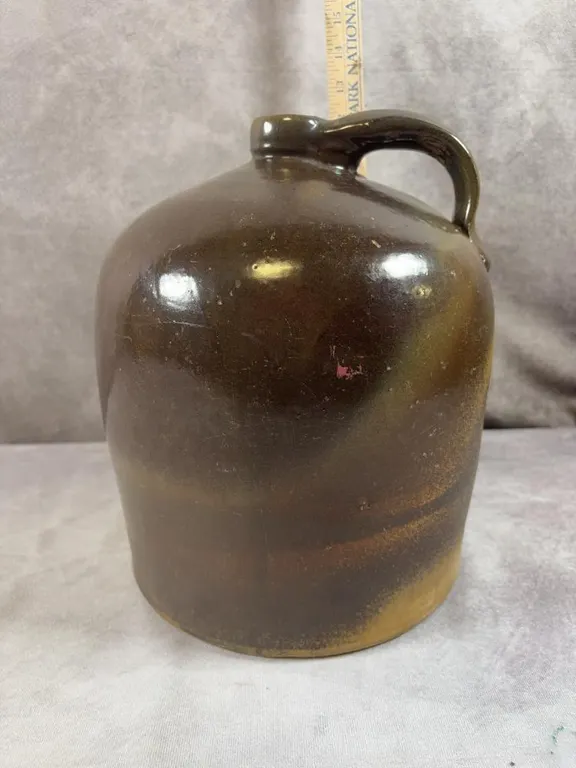 (2) Gallon Albany Glaze Jug. Awesome coloring. Near Excellent Condition. Possible UHL Pottery No Cracks, (1) small chip on outside of mouth