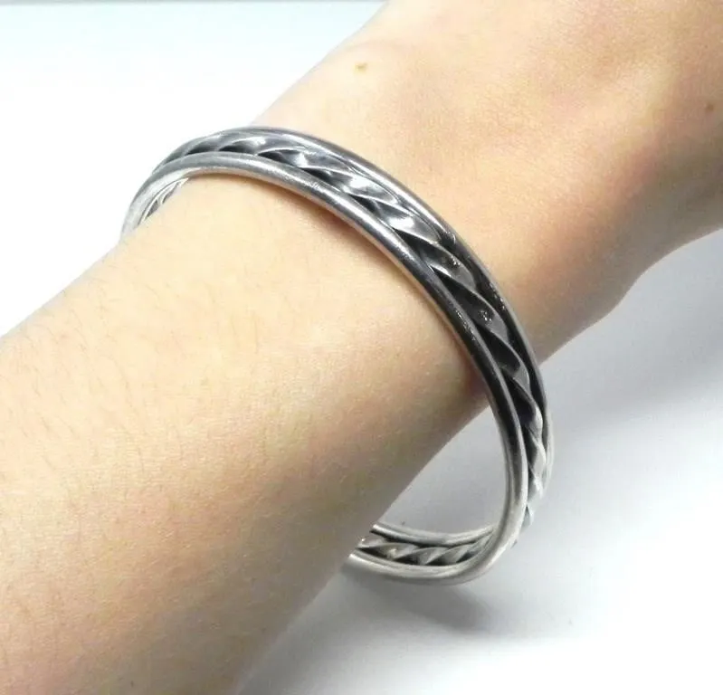 SILVER TWIST BANGLE BRACELET 47.39g