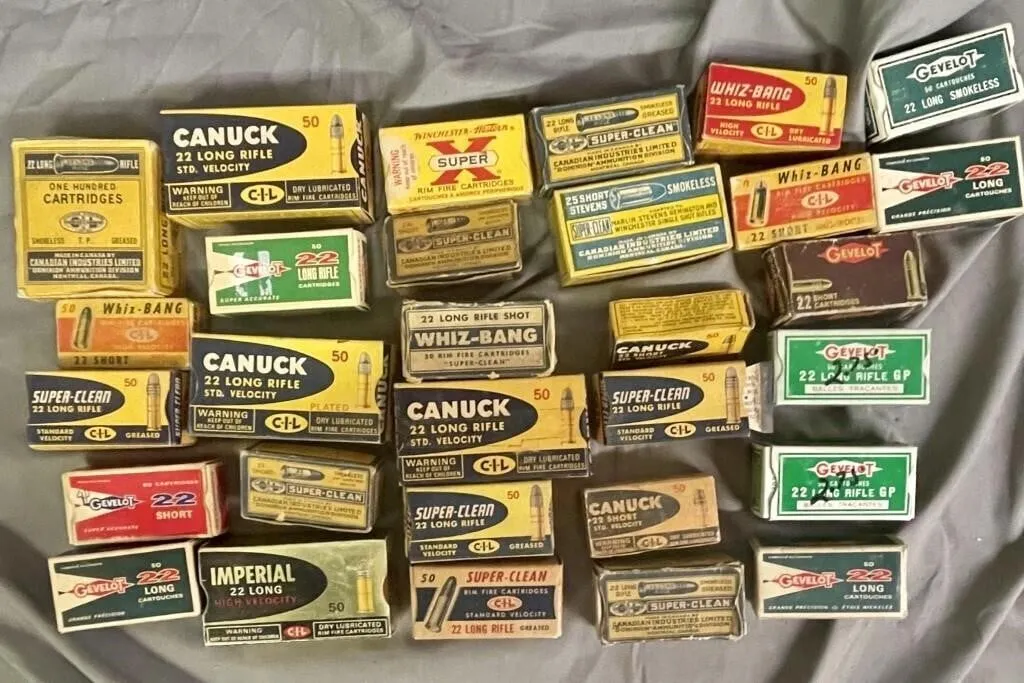 Assortment of 30 empty vintage cartridge boxes.