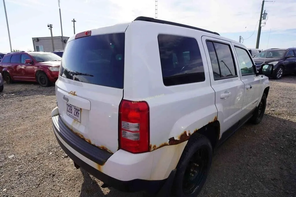 2014 Jeep Patriot SN: 1C4NJRABXED919950