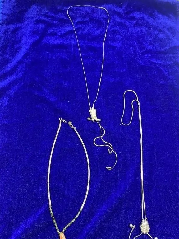 Four Silver-Tone Necklaces incl. Boot Charm &