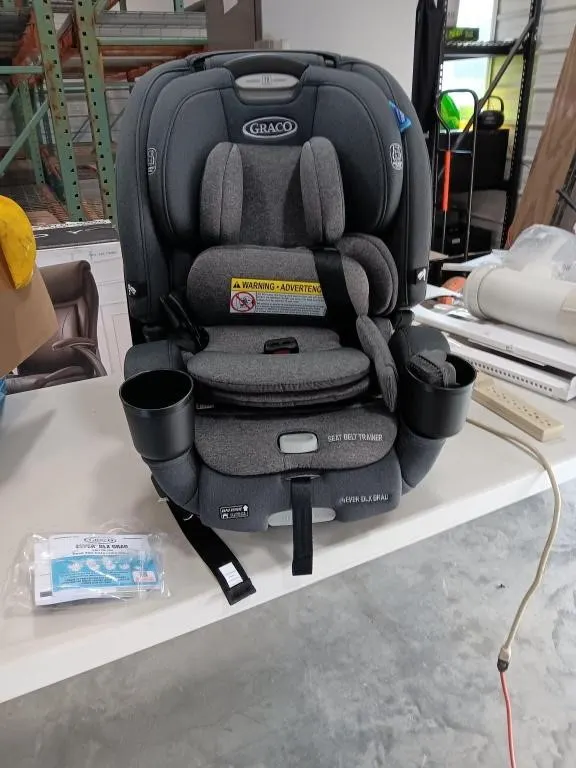 Graco 4Ever DLX 5 In 1 Car Seat. Appears To Be